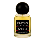 Perfume bottle labeled 'ENCHY PERFUMES N×034' on a black background