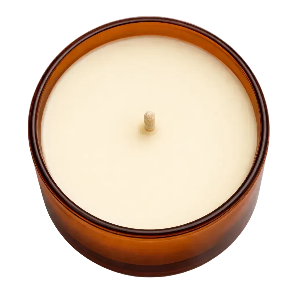 Candle in a brown container on a white background