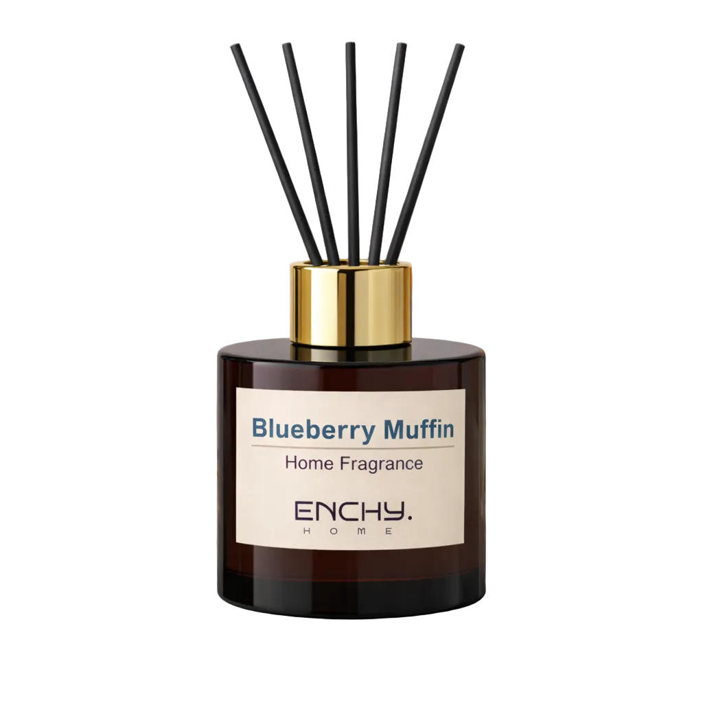 Home fragrance diffuser labeled 'Blueberry Muffin' by Enchy Home with black sticks on a light background.